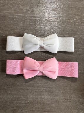 Set Of Two Elastic Bow Belts White Pink Snap Button